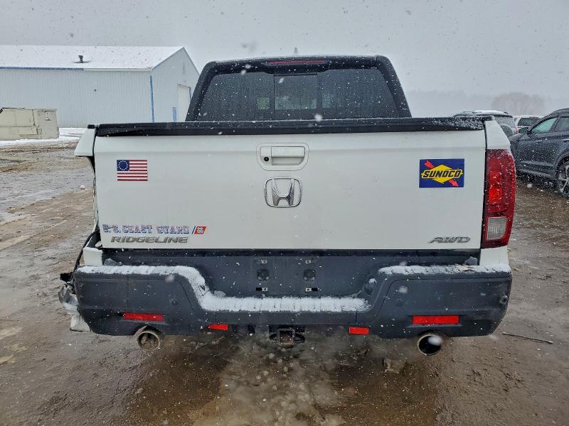 Photo 6 from auction – 2023 HONDA RIDGELINE with VIN 5FPYK3F88PB023976