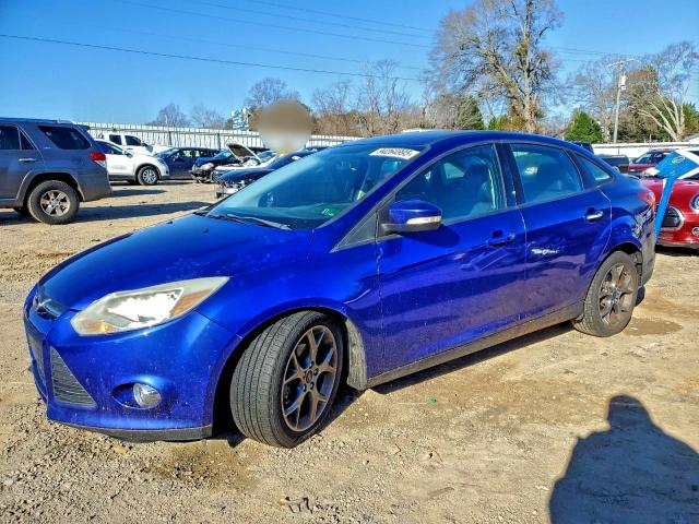 FORD FOCUS SE 2014 with VIN 1FADP3F21EL206690 - Photo from auction