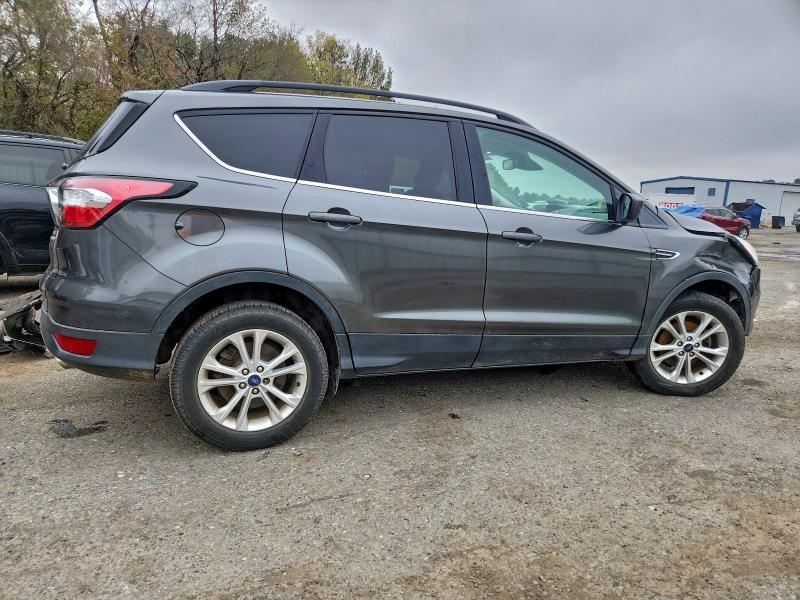 Photo 3 from auction – 2018 FORD ESCAPE with VIN 1FMCU0GD9JUD07747