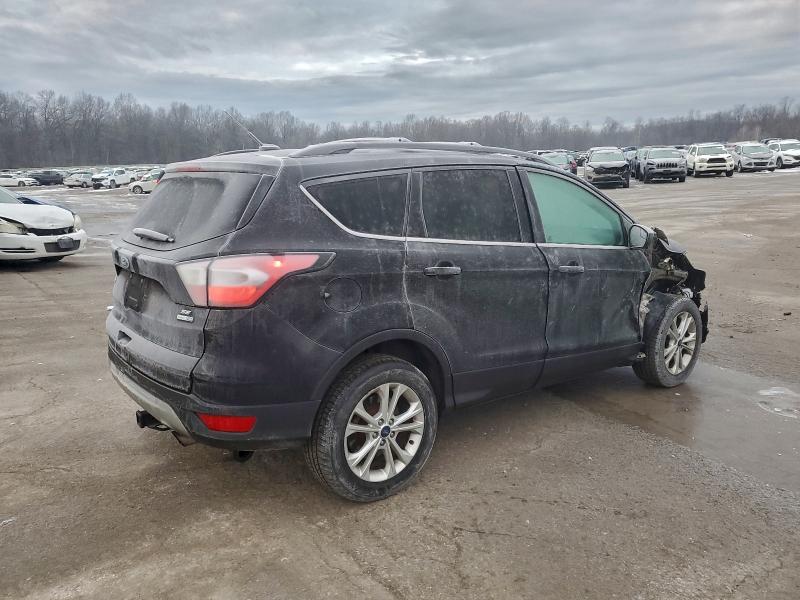 Photo 3 from auction – 2017 FORD ESCAPE SE with VIN 1FMCU9GD1HUC45842