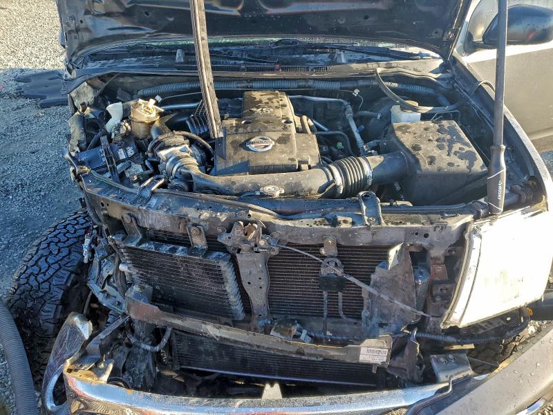 Photo 11 from auction – 2006 NISSAN FRONTIER C with VIN 1N6AD07U76C473352