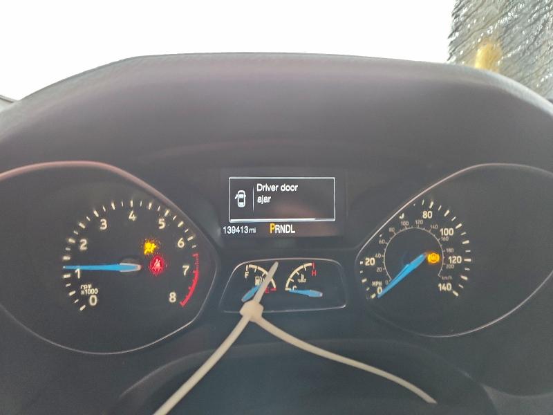 Photo 9 from auction – 2015 FORD FOCUS SE with VIN 1FADP3F24FL254492