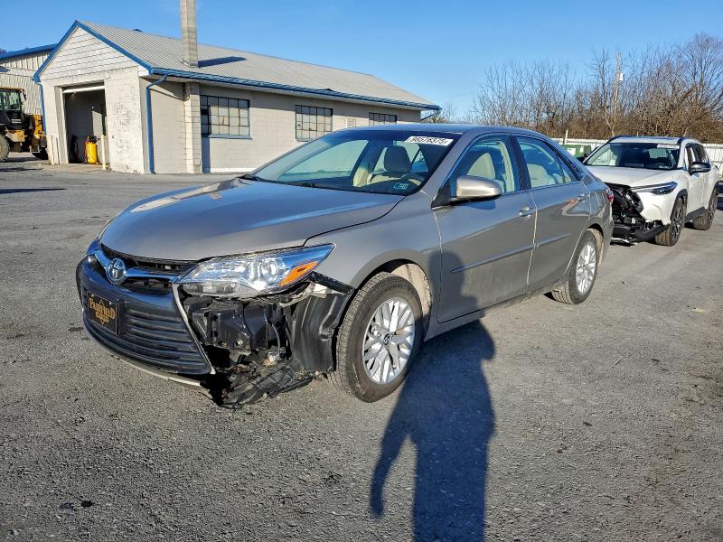 TOYOTA CAMRY LE 2017 with VIN 4T1BF1FK1HU620698 - Photo from auction