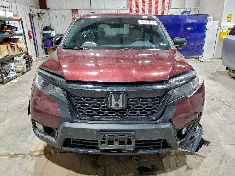 Photo 5 from auction – 2021 HONDA PASSPORT E with VIN 5FNYF8H59MB014874