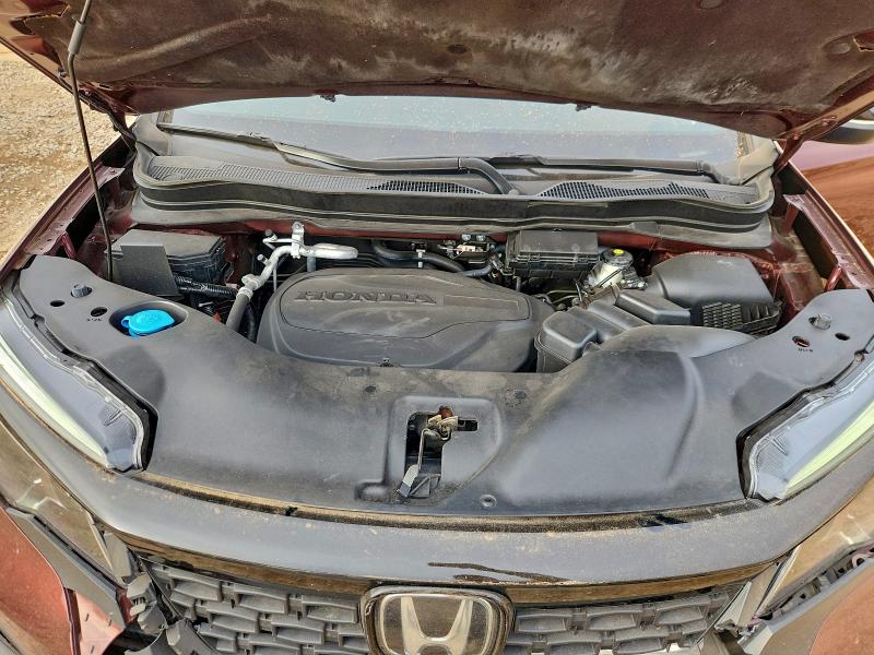 Photo 12 from auction – 2021 HONDA PASSPORT E with VIN 5FNYF7H50MB001456