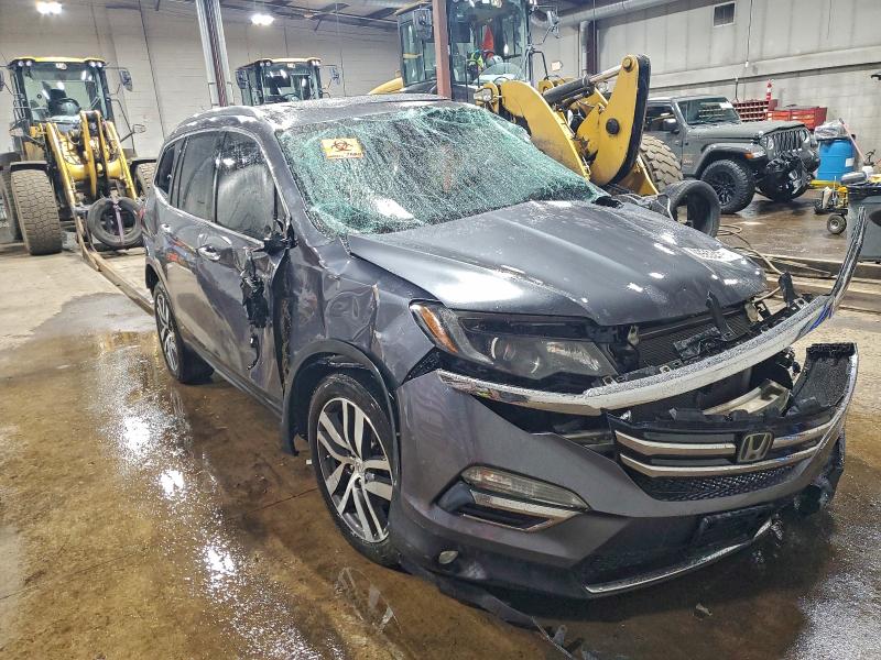 Photo 4 from auction – 2016 HONDA PILOT ELIT with VIN 5FNYF6H06GB054729