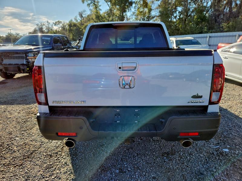 Photo 6 from auction – 2023 HONDA RIDGELINE with VIN 5FPYK3F76PB027810