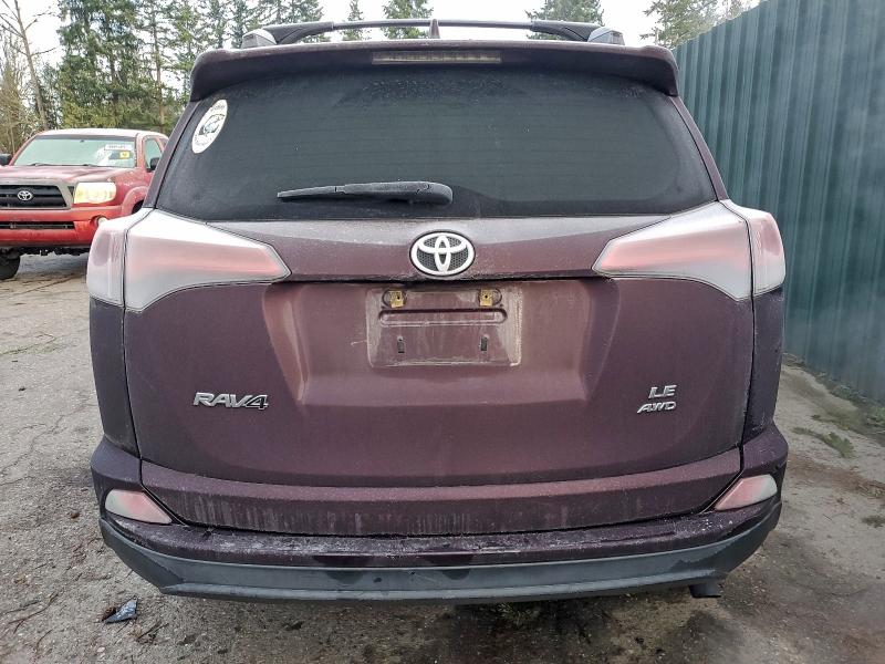Photo 6 from auction – 2018 TOYOTA RAV4 LE with VIN 2T3BFREV6JW749088
