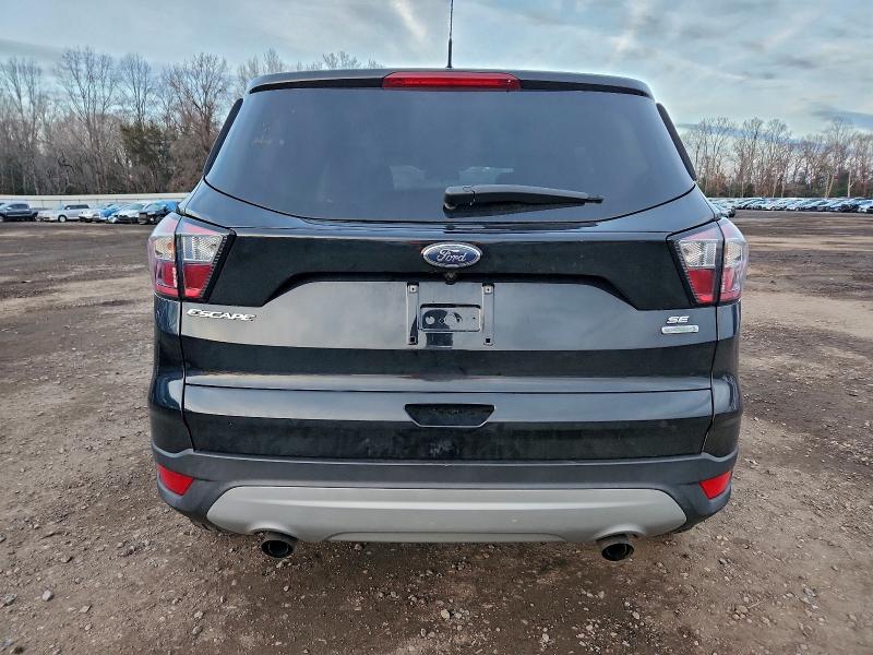 Photo 6 from auction – 2018 FORD ESCAPE SE with VIN 1FMCU0GD7JUA11710