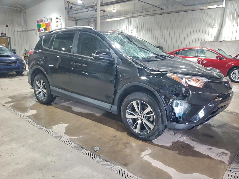 Photo 4 from auction – 2017 TOYOTA RAV4 XLE with VIN 2T3RFREV8HW677111
