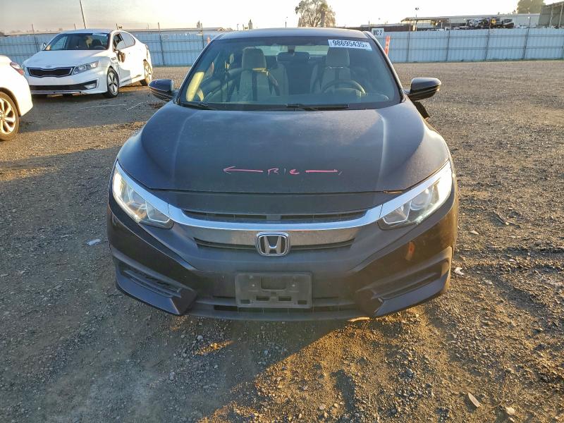 Photo 5 from auction – 2016 HONDA CIVIC LX with VIN 2HGFC4B01GH305438