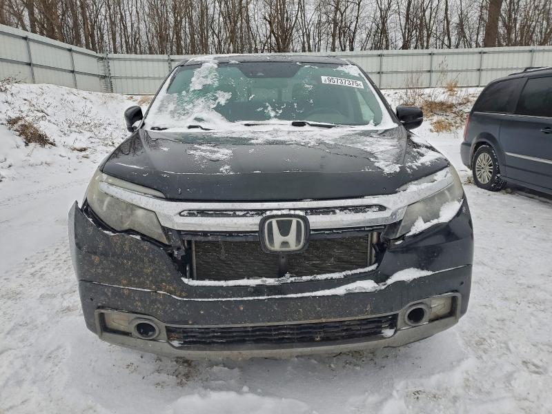 Photo 5 from auction – 2017 HONDA RIDGELINE with VIN 5FPYK3F71HB502040