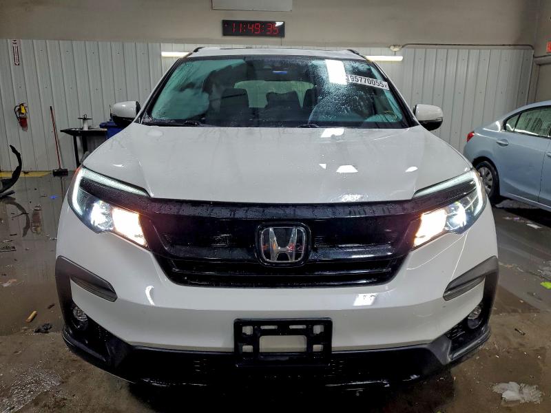 Photo 5 from auction – 2022 HONDA PILOT SE with VIN 5FNYF6H26NB006047
