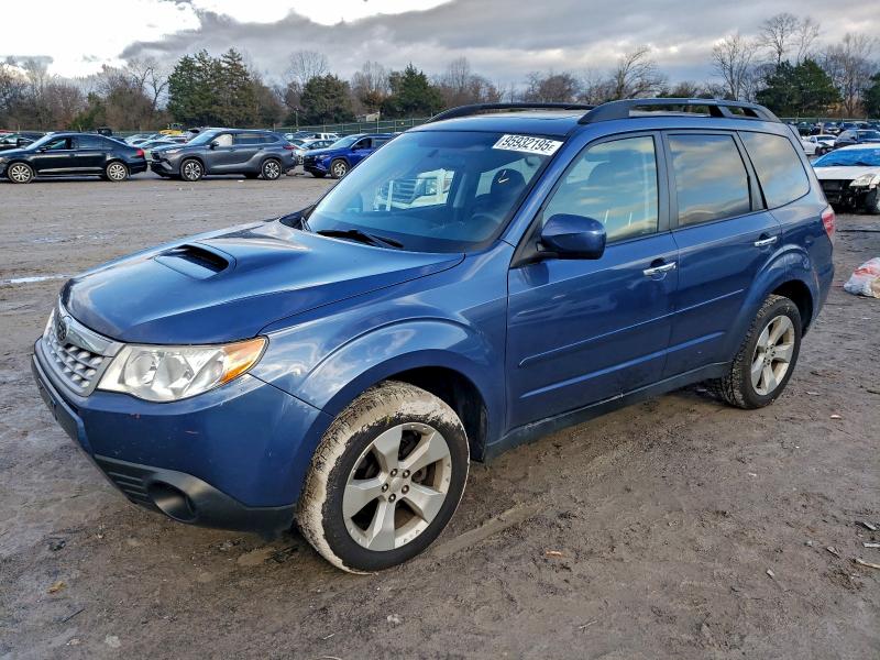 SUBARU FORESTER 2 2011 with VIN JF2SHGAC8BH726990 - Photo from auction