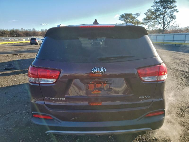 Photo 6 from auction – 2016 KIA SORENTO with VIN 5XYPH4A53GG125555
