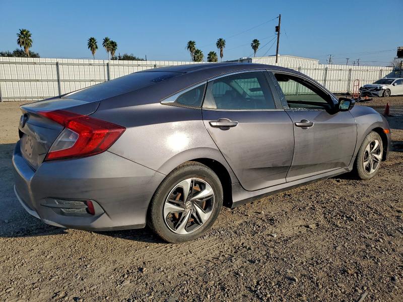 Photo 3 from auction – 2019 HONDA CIVIC LX with VIN 19XFC2F67KE015694