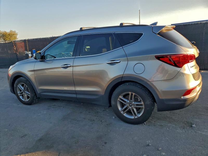 Photo 2 from auction – 2017 HYUNDAI SANTA FE S with VIN 5NMZU3LB1HH012373