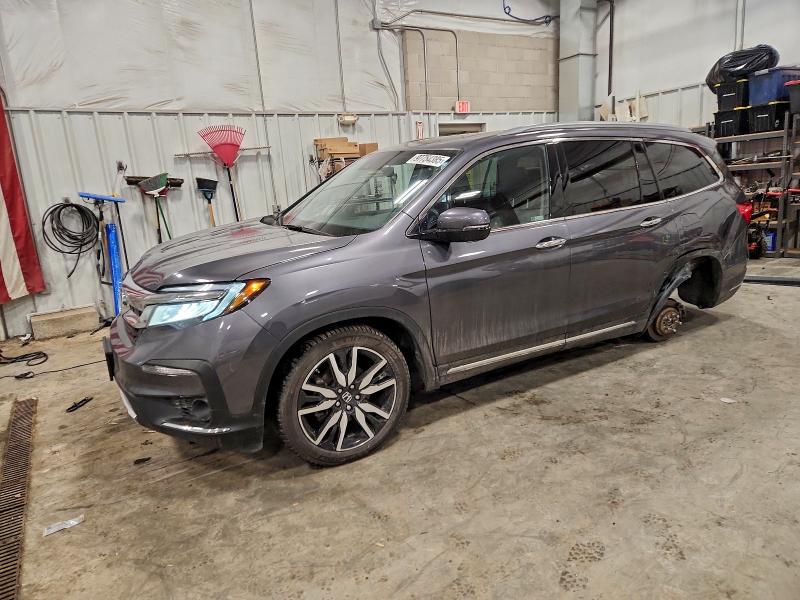 HONDA PILOT ELIT 2021 with VIN 5FNYF6H05MB075731 - Photo from auction