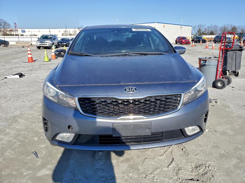 Photo 5 from auction – 2018 KIA FORTE LX with VIN 3KPFL4A76JE266779