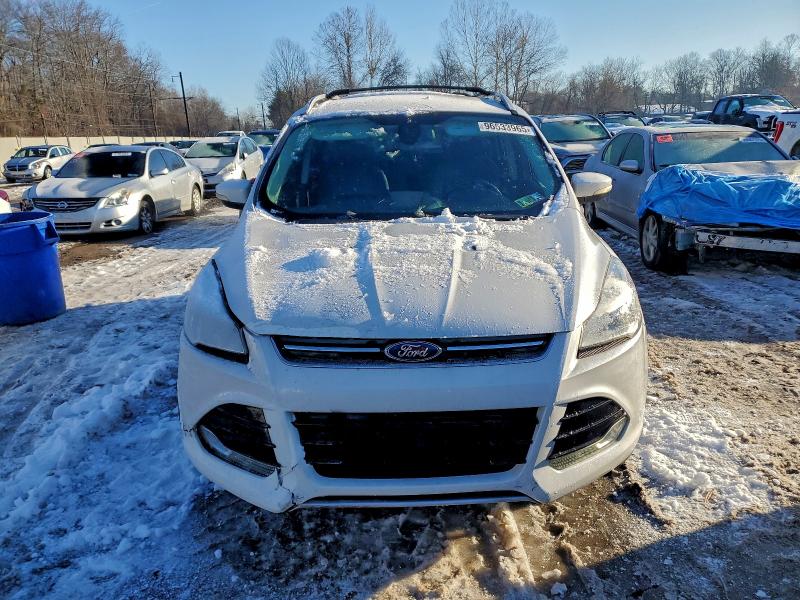 Photo 5 from auction – 2014 FORD ESCAPE with VIN 1FMCU9J92EUE45094