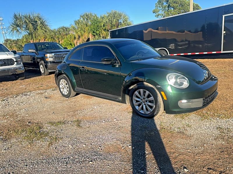 VOLKSWAGEN BEETLE 2014 with VIN 3VWFP7AT6EM624054 - Photo from auction