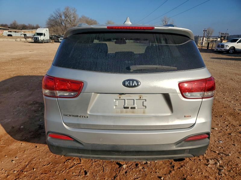 Photo 6 from auction – 2016 KIA SORENTO LX with VIN 5XYPG4A34GG017124