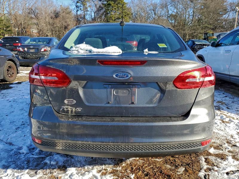 Photo 6 from auction – 2018 FORD FOCUS S with VIN 1FADP3E20JL225758