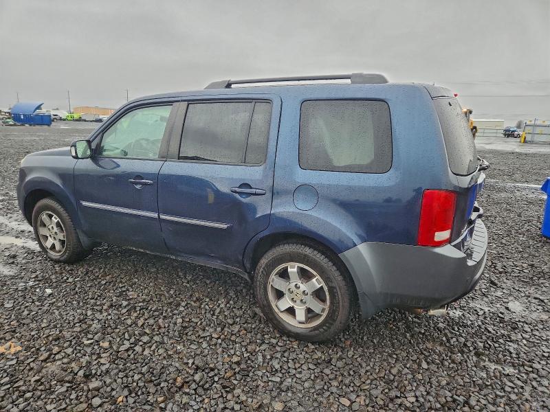 Photo 2 from auction – 2011 HONDA PILOT TOUR with VIN 5FNYF4H97BB011125