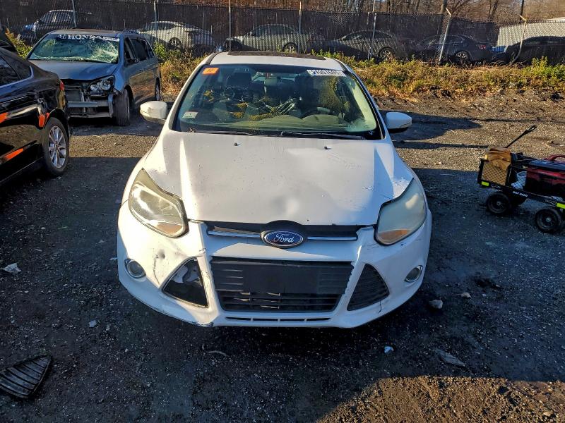 Photo 5 from auction – 2014 FORD FOCUS SE with VIN 1FADP3K28EL455185
