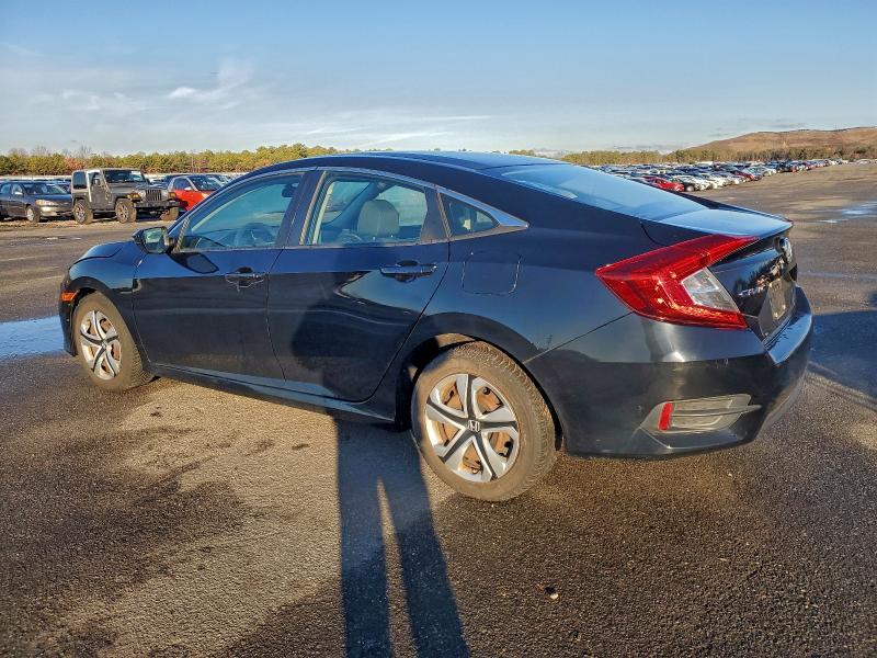 Photo 2 from auction – 2016 HONDA CIVIC LX with VIN 19XFC2F58GE249308