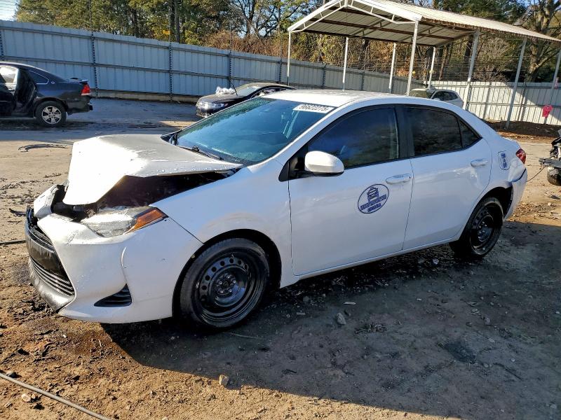 TOYOTA COROLLA L 2019 with VIN 5YFBURHE0KP895709 - Photo from auction