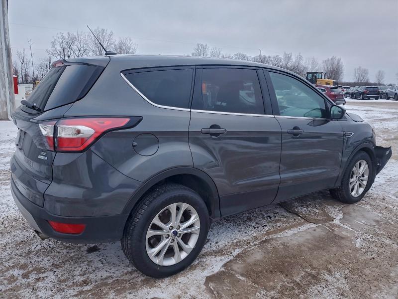 Photo 3 from auction – 2017 FORD ESCAPE SE with VIN 1FMCU9GD3HUE49106
