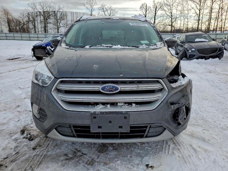 Photo 5 from auction – 2018 FORD ESCAPE SE with VIN 1FMCU9GD7JUC53787