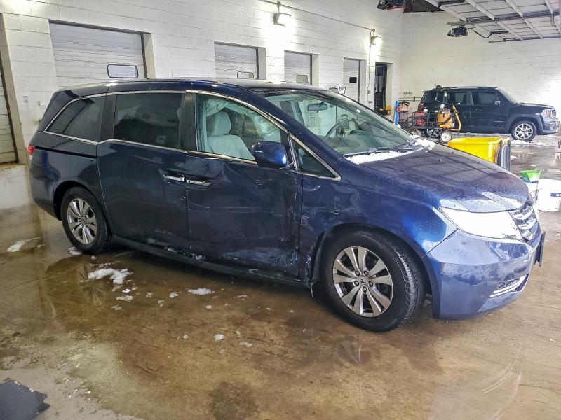 Photo 4 from auction – 2014 HONDA ODYSSEY EX with VIN 5FNRL5H41EB132888