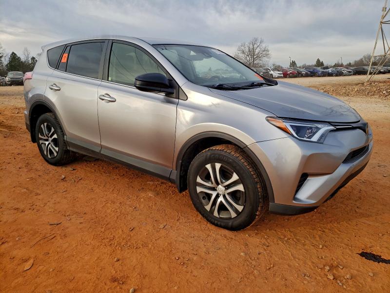 Photo 4 from auction – 2018 TOYOTA RAV4 LE with VIN JTMBFREVXJD252011