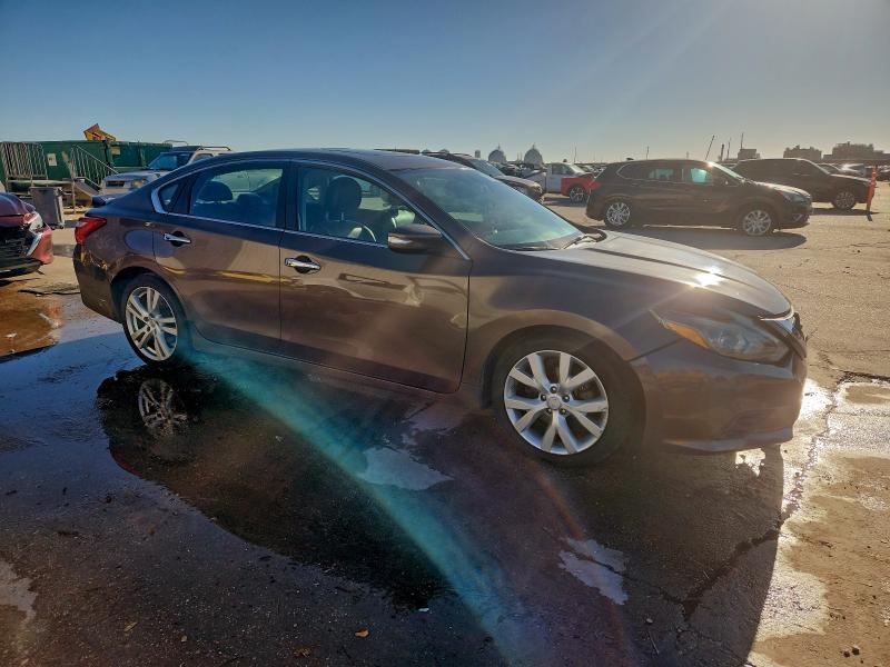 Photo 4 from auction – 2016 NISSAN ALTIMA 3.5 with VIN 1N4BL3AP4GC117284