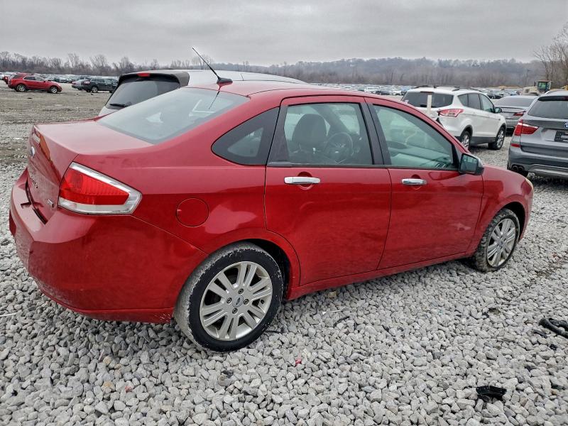 Photo 3 from auction – 2010 FORD FOCUS with VIN 1FAHP3HNXAW141954
