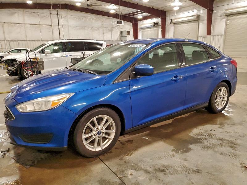 FORD FOCUS SE 2018 with VIN 1FADP3F25JL327345 - Photo from auction