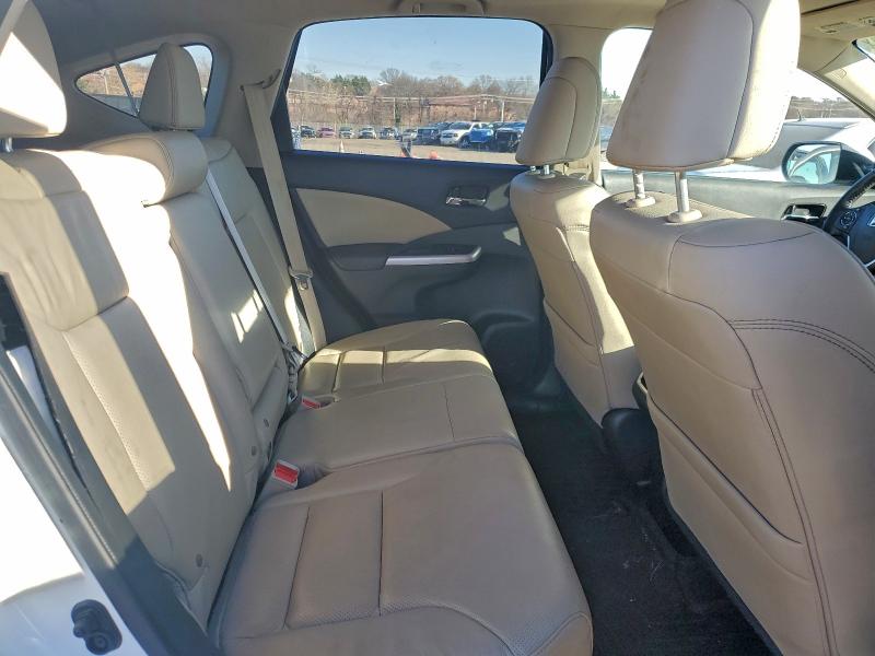 Photo 11 from auction – 2016 HONDA CR-V EXL with VIN 5J6RM4H74GL065750