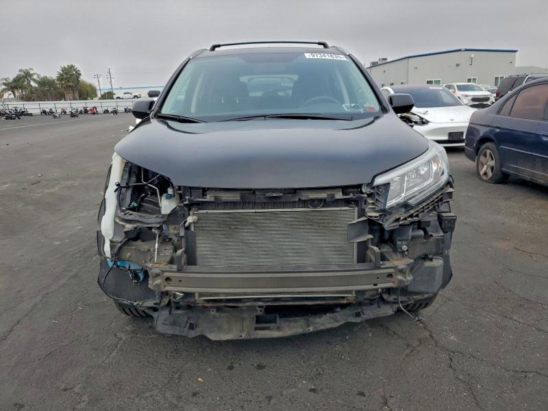 Photo 5 from auction – 2016 HONDA CR-V EX with VIN 5J6RM4H59GL138531