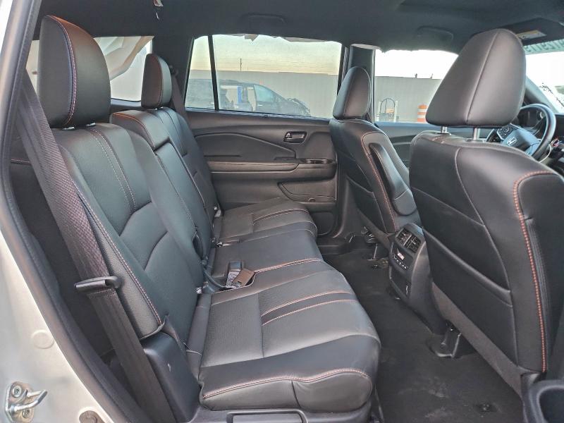 Photo 11 from auction – 2022 HONDA PILOT TRAI with VIN 5FNYF6H81NB022192