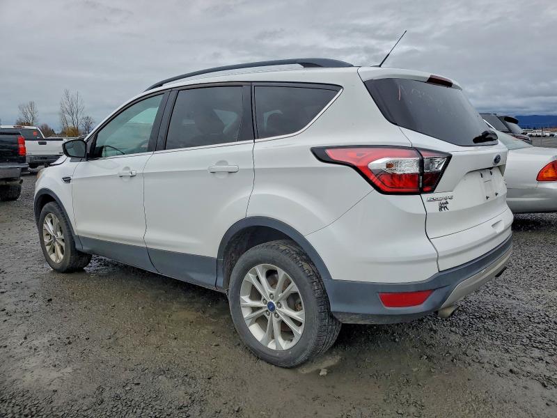 Photo 2 from auction – 2018 FORD ESCAPE SE with VIN 1FMCU9GD0JUA92411