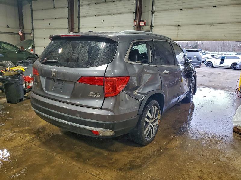 Photo 3 from auction – 2016 HONDA PILOT ELIT with VIN 5FNYF6H06GB054729