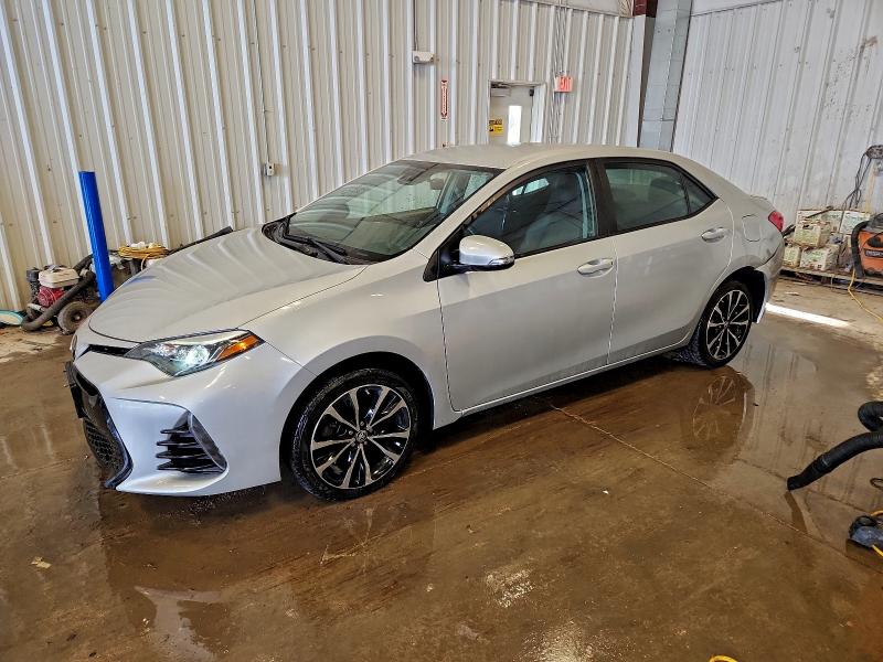 TOYOTA COROLLA L 2017 with VIN 5YFBURHE8HP673265 - Photo from auction