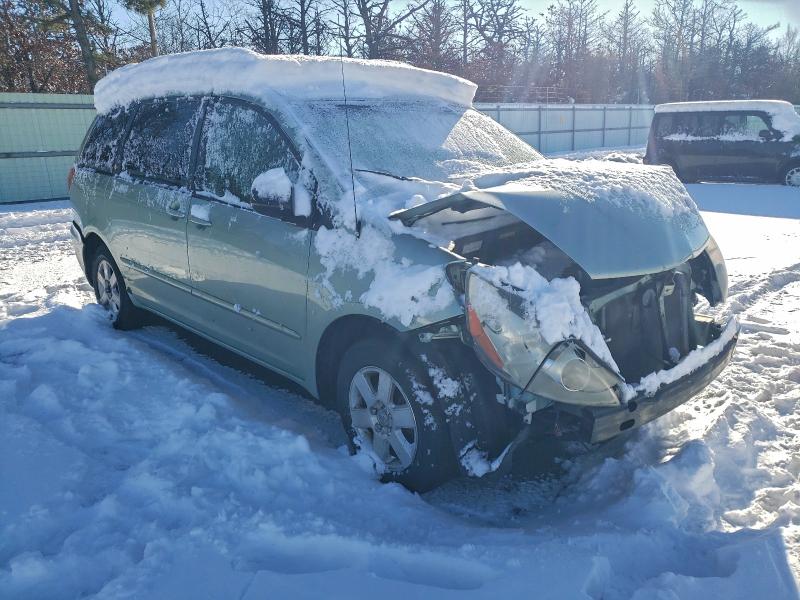 Photo 4 from auction – 2010 TOYOTA SIENNA CE with VIN 5TDKK4CC1AS301326