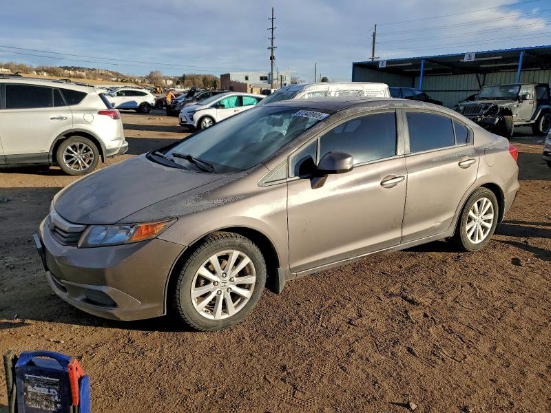 HONDA CIVIC EX 2012 with VIN 2HGFB2F83CH517386 - Photo from auction