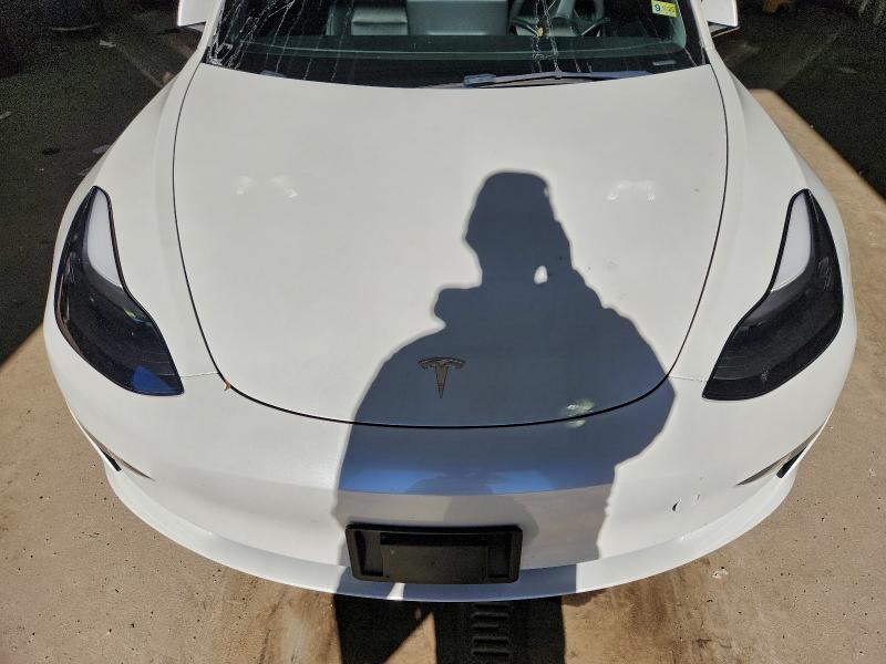 Photo 11 from auction – 2023 TESLA MODEL 3 with VIN 5YJ3E1EA4PF477578