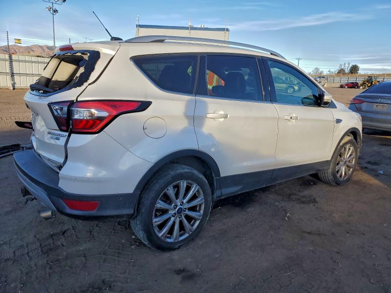 Photo 3 from auction – 2017 FORD ESCAPE TIT with VIN 1FMCU9J94HUE02932