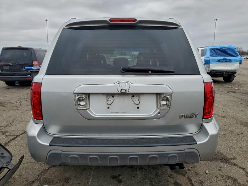 Photo 6 from auction – 2005 HONDA PILOT EX with VIN 2HKYF18475H509012