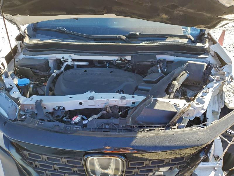 Photo 12 from auction – 2021 HONDA PASSPORT E with VIN 5FNYF7H51MB008416